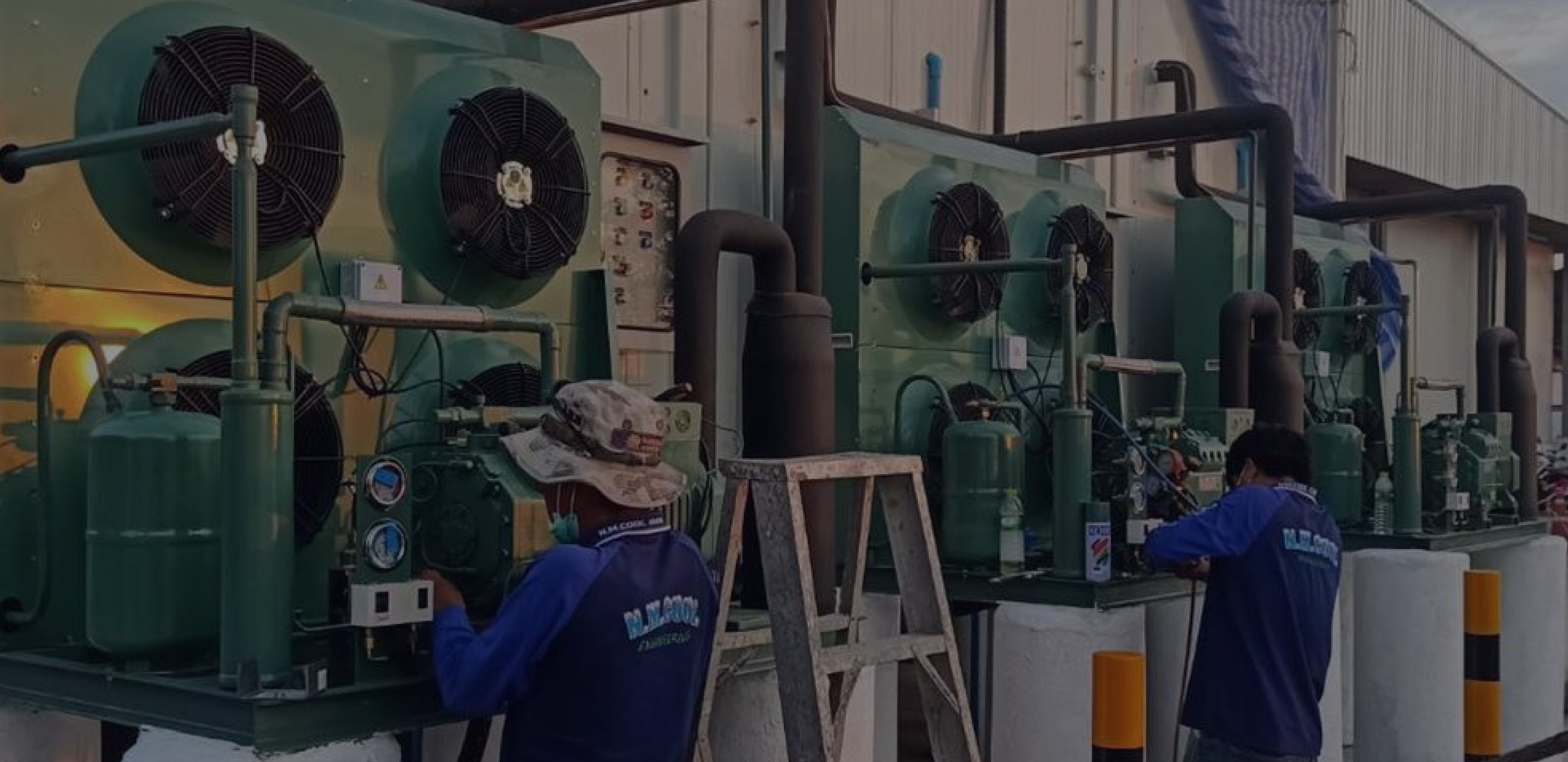 XMK refrigeration technicians maintaining cold storage equipment